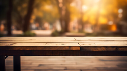 Empty wooden table in front of blur background