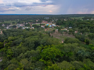 Fototapeta na wymiar Aerial landscape of rainforest and village during summer in Nobres Bom Jardim Mato Grosso