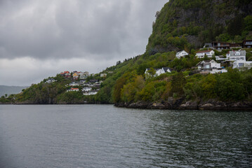 Fototapeta na wymiar Houses on the Norway fjords
