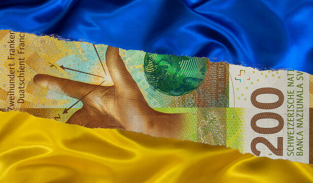 200 Swiss franc banknote and Ukrainian national flag