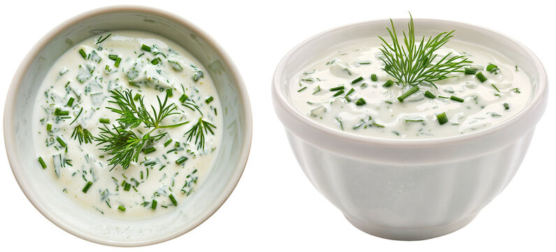 bowl with ranch dressing made with mayonnaise, sour cream, buttermilk, garlic, dill, parsley, and chives, isolated on a white background