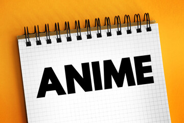 Anime is hand-drawn and computer-generated animation originating from Japan, text concept on notepad