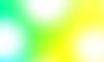 Abstract blurred background image of green, yellow colors gradient used as an illustration. Designing posters or advertisements.