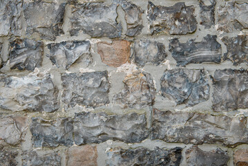 Fragment of an antique wall - stone texture background