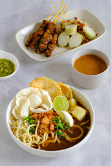 noodle and chicken satay in frame