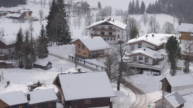 Aerial view of snow covered Ramsau am Dachstein during winter, Styria, Austria.