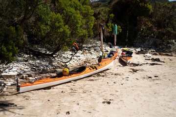 canoe and kayak on a sandy beach in Australia in summer. kayaking on the sea
