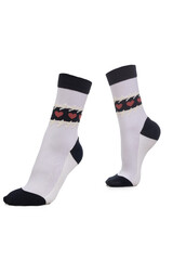 Close-up shot of a see-through socks with a black and white pattern. A pair of women's black and white nylon socks is isolated on a white background. Side view.