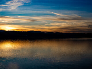 Fototapeta premium Sunset on Coeur d'Alene Lake from Coeur d'Alene Lake Drive Bike Path