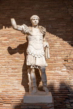 Ancient statue in ruins portraiting a roman general