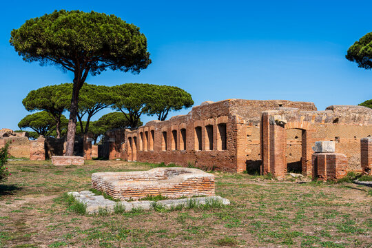 Exterior facade in ruins of ancient roman buildings at archaeological park in Italy