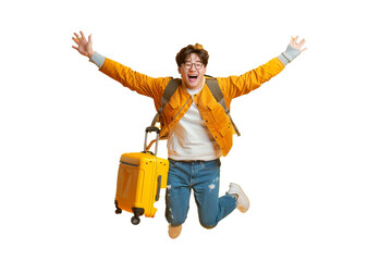 Happy young Asian tourist with luggage jumping isolated on yellow studio background