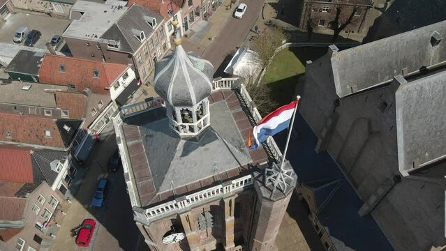Aerial view of catholic church with dutch flag at kingsday, Workum, Friesland, Netherlands