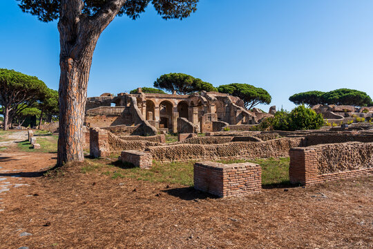 Ruins of ancient roman buildings at archaeological park in Italy