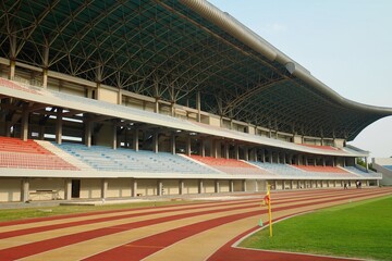 Yogyakarta, Indonesia, Oct 4, 2023. The main stands for spectators and the green field at Mandala Krida Stadium.