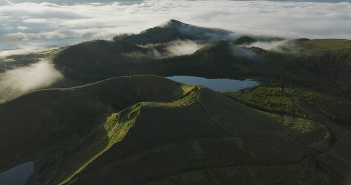 Aerial view of Lake Atitlan in sunset with firing Volcano San Pedro and Volcano Toliman, Azores, Lagoa das Sete Cidades, Portugal, Sao Miguel Island.