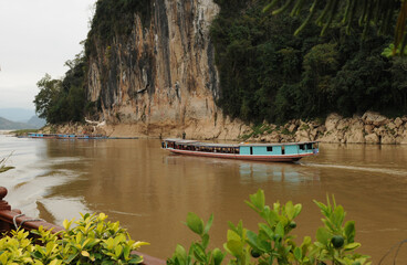 Laos: Mekong Cruise to Pak Ou Caves near Luang Brabang City