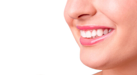 Fototapeta premium Healthy white smile close up. Beauty woman with perfect smile, lips and teeth. Beautiful Model Girl with perfect skin. Teeth whitening. World Smile Day.