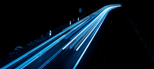 blue car lights at night. long exposure