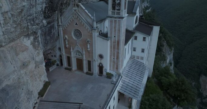Aerial view of Madonna della Corona church on a steep cliff, Spiazzi, Veneto, Italy.