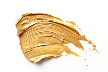 Close up of golden substance on white surface. Perfect for backgrounds