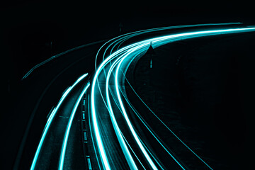 blue car lights at night. long exposure