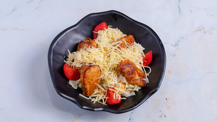 Chicken caesar salad bowl isolated