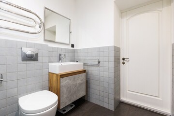 modern bathroom room with toilet and washing machine