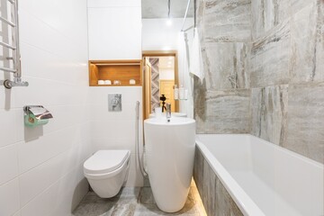 modern bathroom room with toilet and washing machine