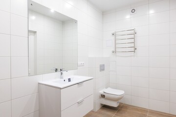 modern bathroom room with toilet and washing machine