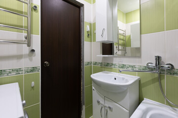 modern bathroom room with toilet and washing machine