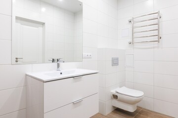 modern bathroom room with toilet and washing machine