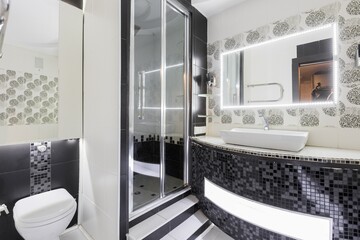 modern bathroom room with toilet and washing machine