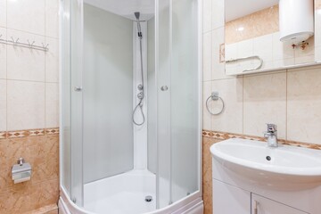 modern bathroom room with toilet and washing machine