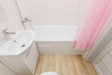 modern bathroom room with toilet and washing machine