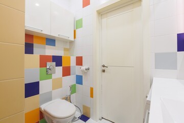 modern bathroom room with toilet and washing machine