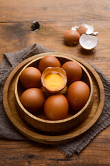 Top View Eggs in a Wooden Bowl. 
