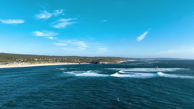 Aerial view of Gnarabup beach with kite surfers, Western Australia.