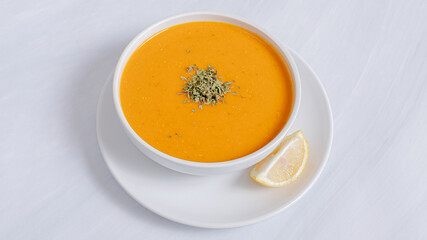 Lentil soup bowl isolated top view