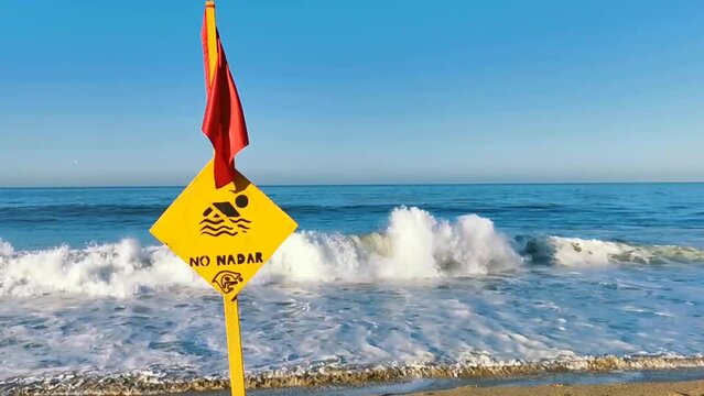 Red flag swimming prohibited high waves in Puerto Escondido Mexico.