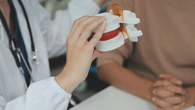 Doctor with human Pancreatitis anatomy model with Pancreas, Gallbladder, Bile Duct, Duodenum, Small intestine. Pancreatic cancer, Acute and Chronic pancreatitis, Digestive system and Health concept