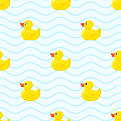 yellow rubber duck on blue background. Seamless pattern. Texture for fabric, wrapping, wallpaper. Decorative print.Vector illustration	
