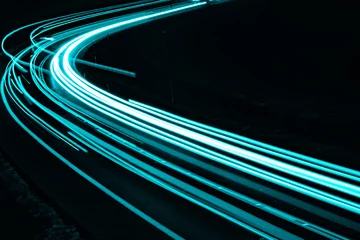 Tuinposter blue car lights at night. long exposure © Krzysztof Bubel