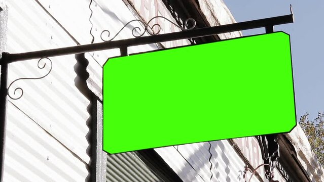 An Old Bar or Restaurant Sign with Green Screen. Close Up. You can replace green screen with the footage or picture you want with “Keying” effect in After Effects (check out tutorials on YouTube).