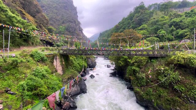 Storm clouds over mountains of Jang town deep in the  nurangang river bridge in tawang district of arunachal pradesh in India.