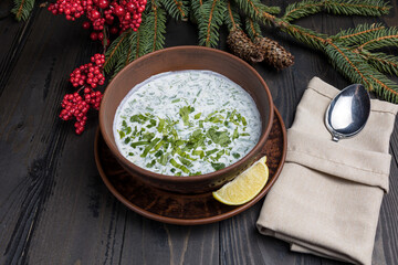 Cold tzatziki soup with cucumber, lemon and parsley