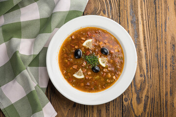 Soup with lentils, olives and lemon