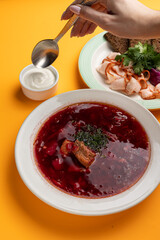 Traditional ukrainian borscht with sour cream