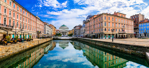 Landmarks and beautiful places (cities) of northern Italy - elegant Trieste town with charming streets and canals - 759013821