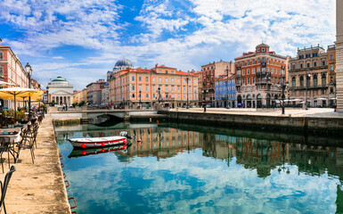 Landmarks and beautiful places (cities) of northern Italy - elegant Trieste town with charming streets and canals - 759014234